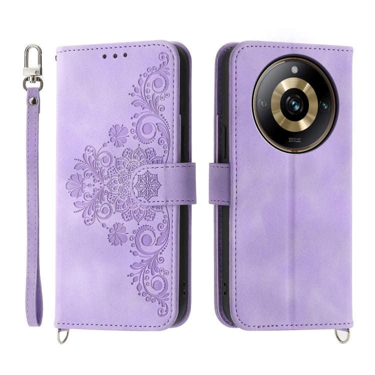 Purple embossed floral leather wallet phone case with wrist strap and flip cover