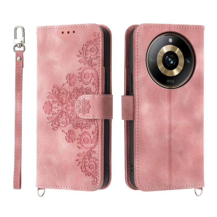 Pink embossed floral leather wallet phone case with wrist strap and flip cover
