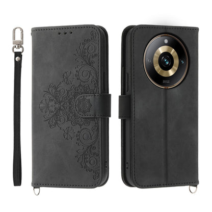Dark gray embossed floral leather wallet phone case with wrist strap and flip cover