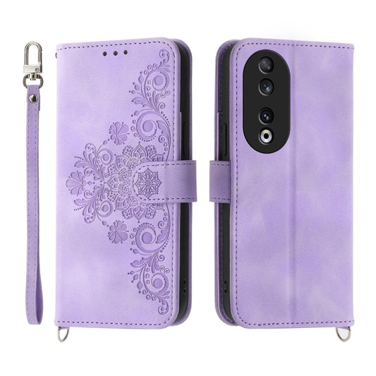 Purple embossed floral leather wallet phone case with flip cover and wrist strap