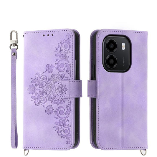 Purple embossed floral folio wallet phone case with magnetic strap and wrist lanyard