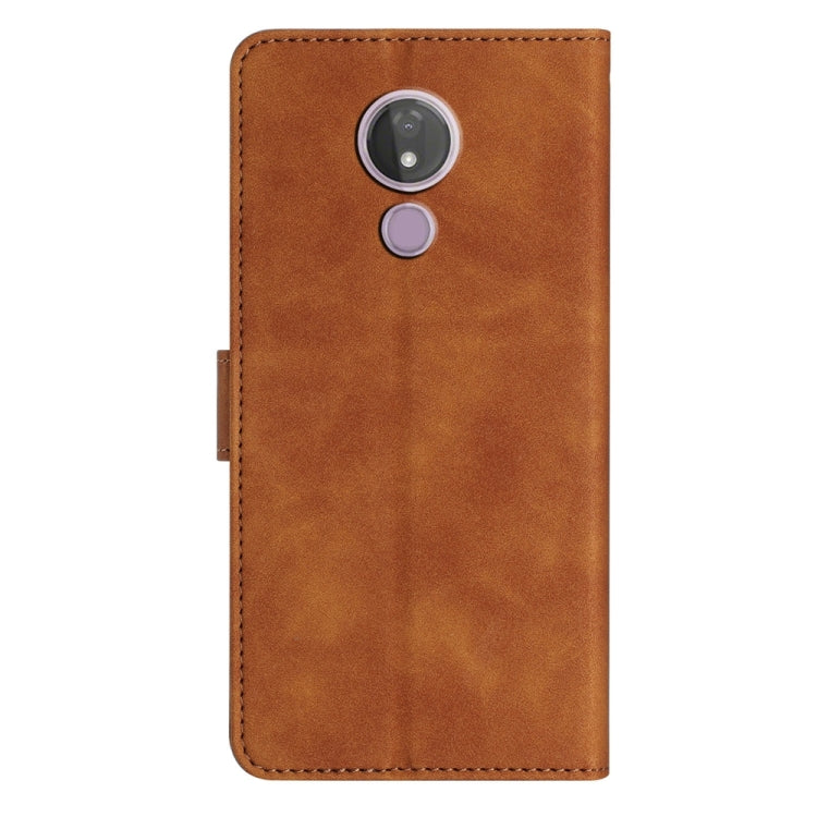 Brown embossed butterfly leather phone case with camera and flash cutouts