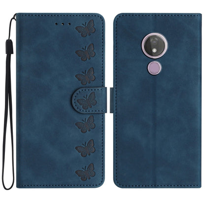 Embossed leather phone case in blue with butterfly pattern, magnetic flip, camera cutout