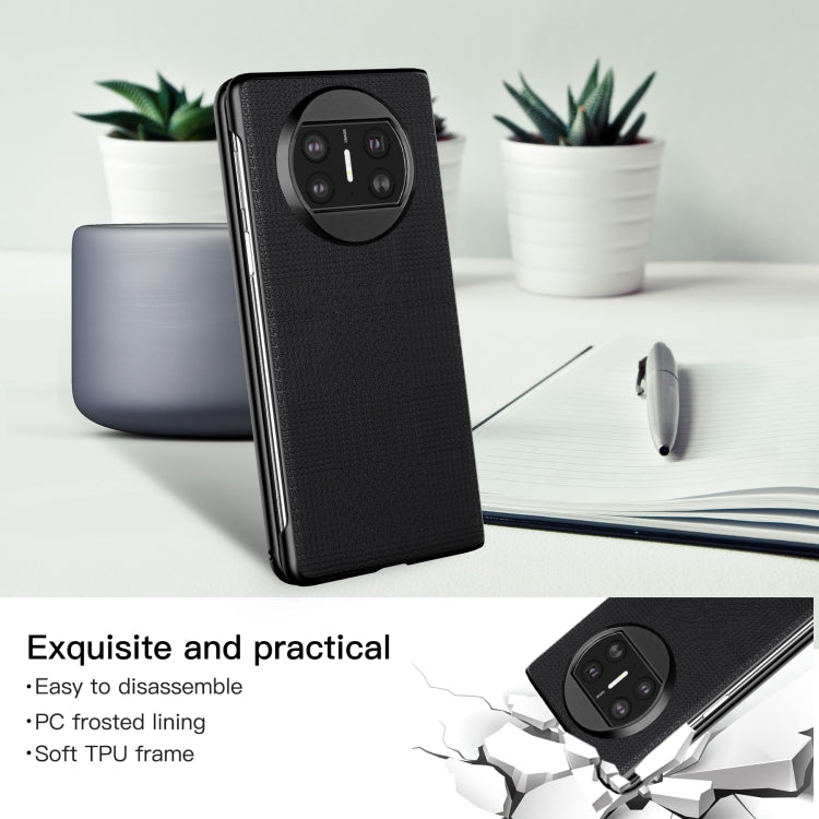 Black shockproof phone case with textured finish and raised quad camera cover