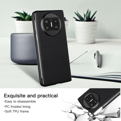 Black shockproof phone case with textured finish and raised quad camera cover