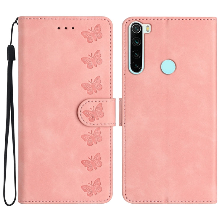 Pink embossed leather phone case with butterfly pattern and front flap, side wrist strap