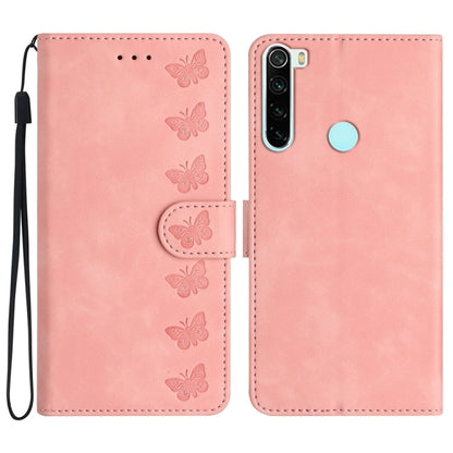 Pink embossed leather phone case with butterfly pattern and front flap, side wrist strap