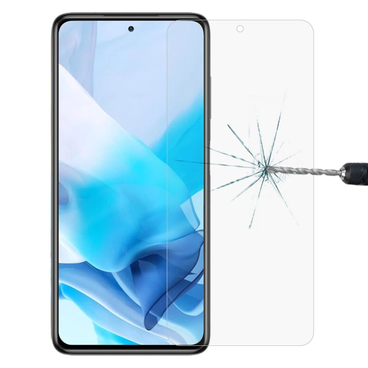 Clear tempered glass screen protector with full coverage for smartphone display, camera cutout