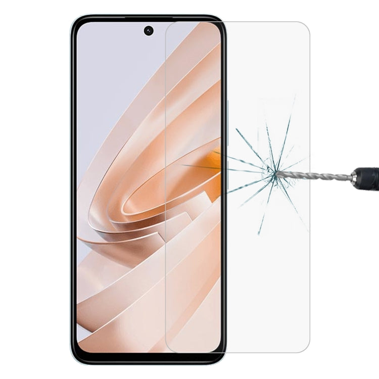 Clear tempered glass screen protector placed on phone, crack test example