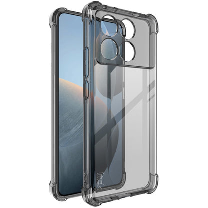 Shockproof TPU phone case, dark transparent with raised camera guard and reinforced corners