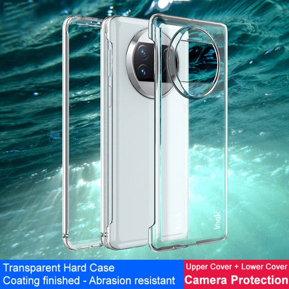 Transparent hard case with camera cutouts and raised bumper edges