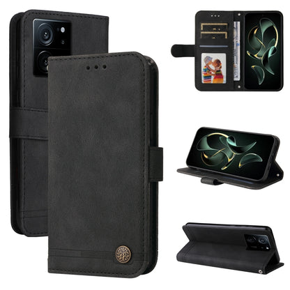 Black leather wallet phone case with card slots and magnetic stand, metal button closure.