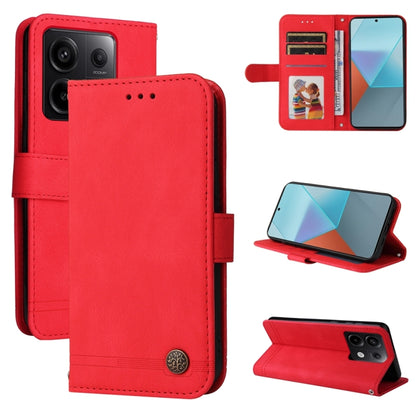 Red leather wallet phone case with card slots and magnetic stand, metal button closure.
