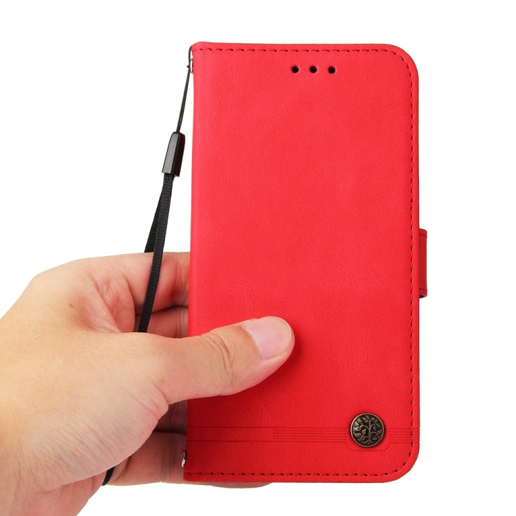 Red leather folio phone case with metal button and hand strap loop