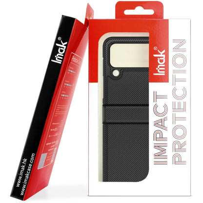 IMAK Ruiyi series phone case shown in retail packaging, dark gray carbon fiber style.