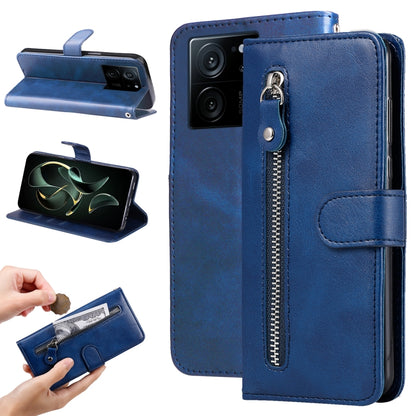 Blue textured leather folio phone case with vertical zipper, card pocket, and magnetic flap