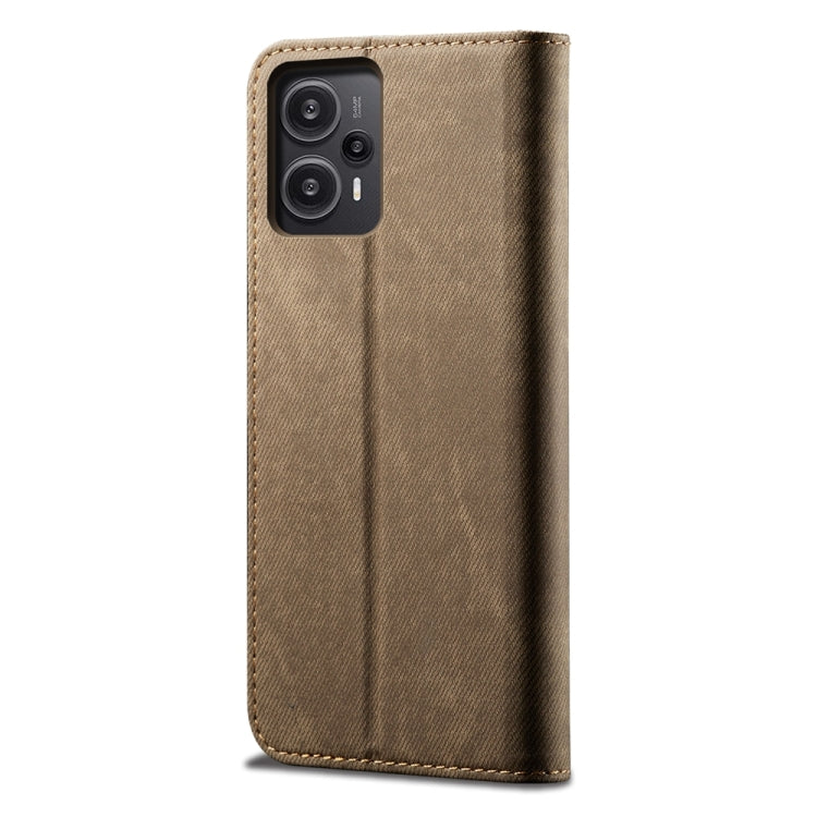 Denim-textured khaki flip phone case back with camera cutout and vertical seam stitching