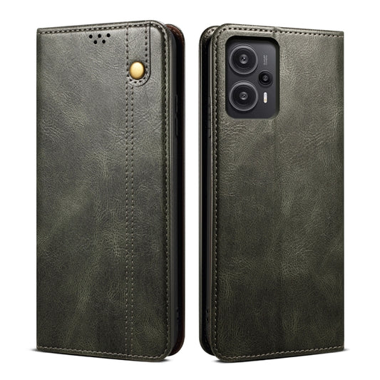 Dark green flip leather phone case with circular snap and camera cutout