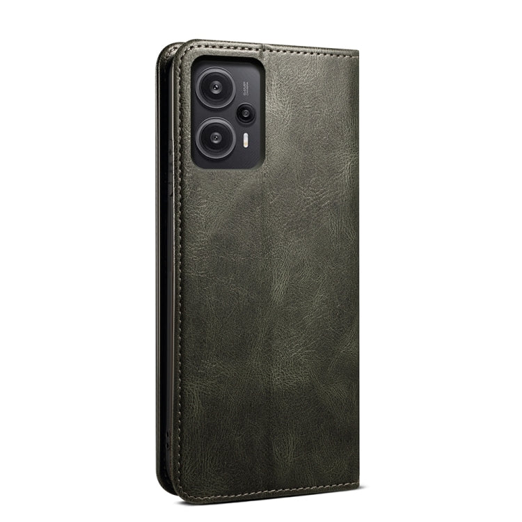Dark green flip leather phone case back with camera openings and stitched edges