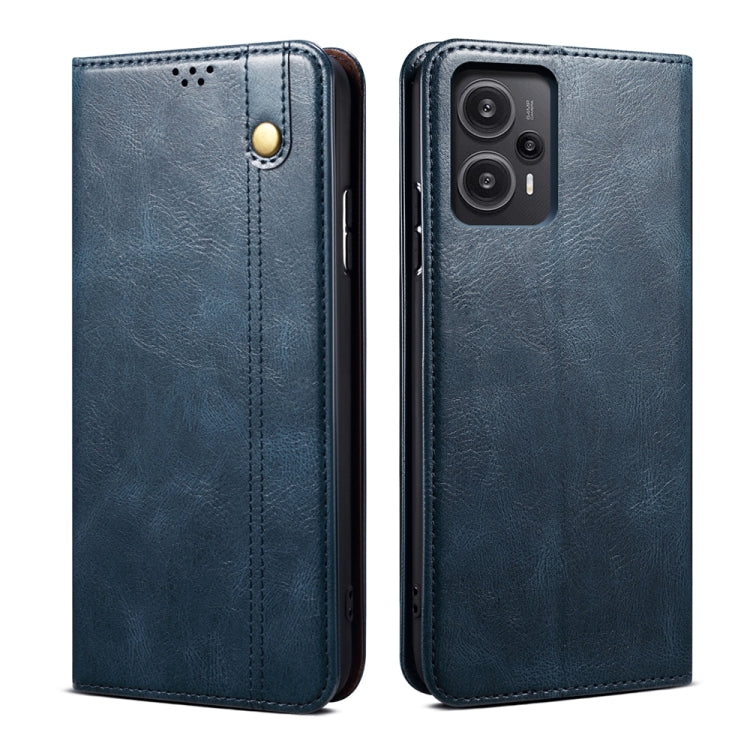 Blue flip leather phone case with circular snap and camera cutout