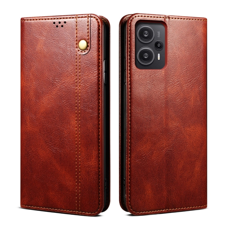 Brown flip leather phone case with circular snap and camera cutout
