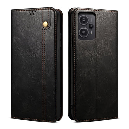 Black flip leather phone case with circular snap and dual camera cutouts