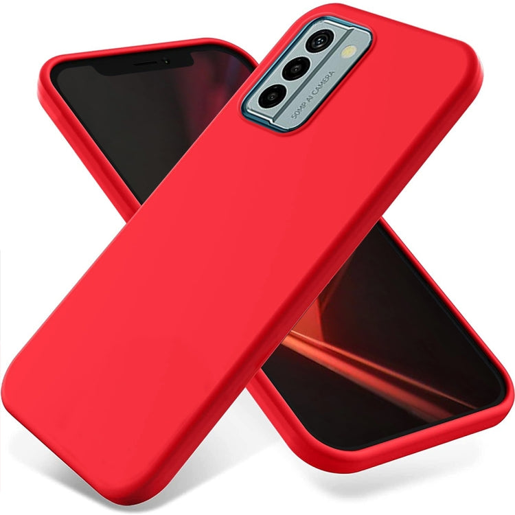 Red liquid silicone phone case with raised edges and triple camera cutout