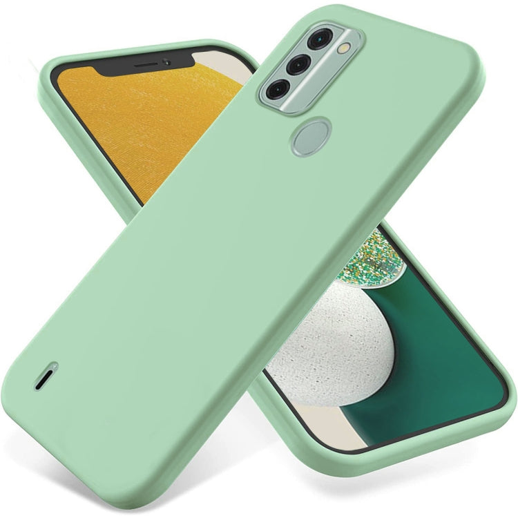 Mint green liquid silicone phone case with raised edges, triple camera cutout, and fingerprint