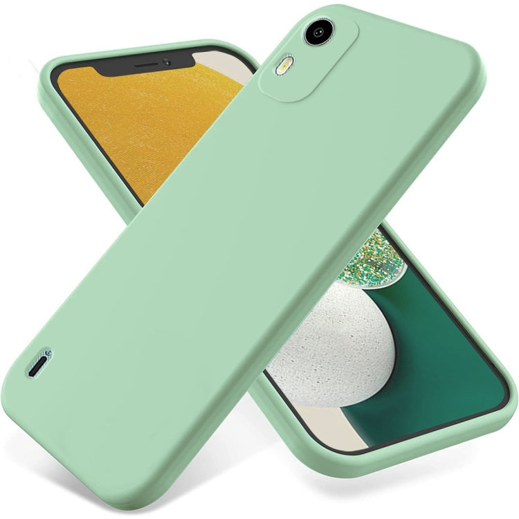 Mint green liquid silicone phone case with raised edges and single camera cutout