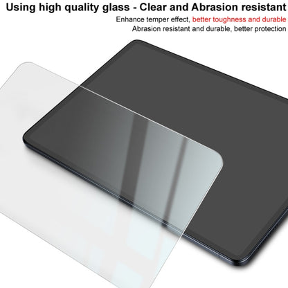 Clear tempered glass screen protector film, angled view over tablet screen