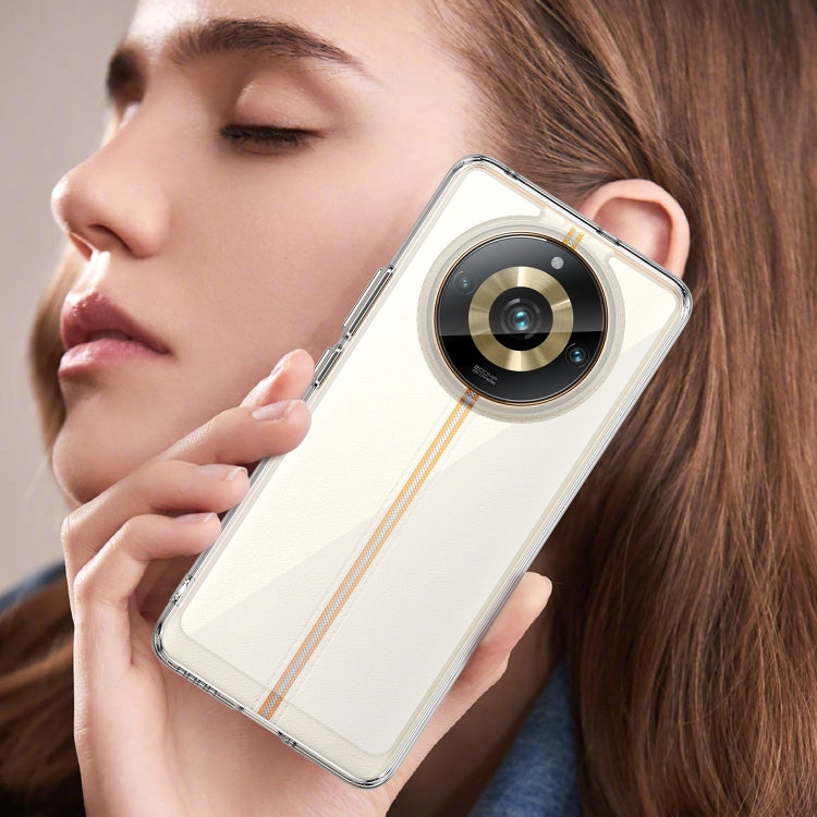 Transparent hybrid TPU phone case with beige back and orange stripe, shown in hand for Realme 11 Pro+