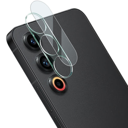 Rear camera lens tempered glass film on black phone back, clear overlays for cameras