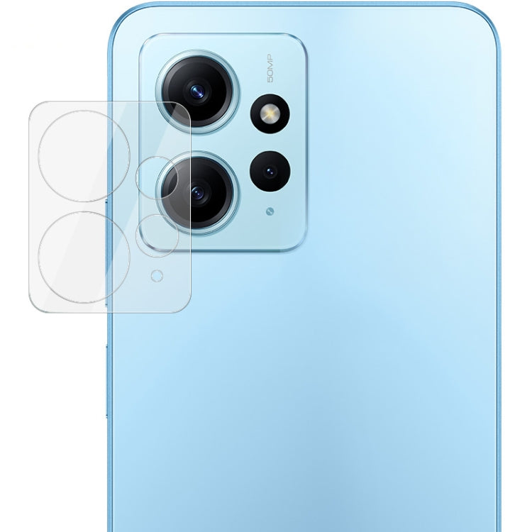 Clear lens film covers phone rear camera module with cutouts for lenses