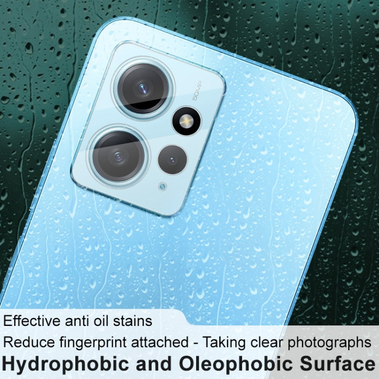Tempered glass lens film on blue phone back, clear over camera lenses