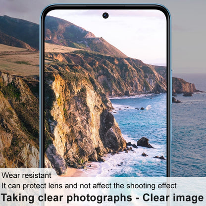 Smartphone front display with landscape wallpaper, no lens film shown