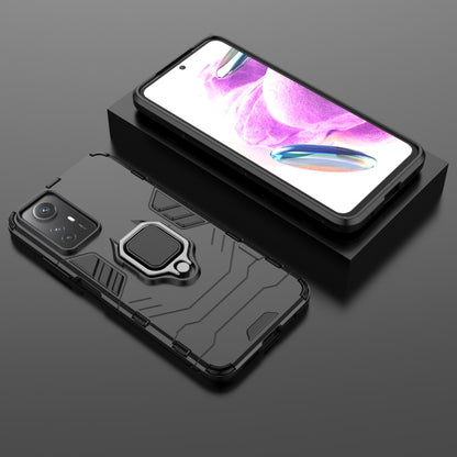 Magnetic ring phone case, rugged armor style with raised ring holder, black color.