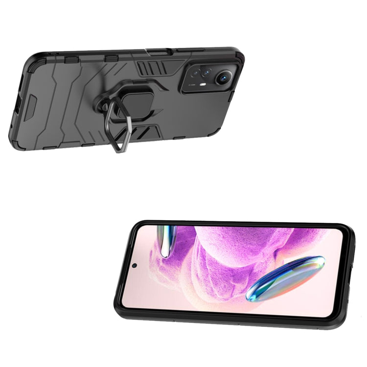 Magnetic ring phone case with textured armor pattern, dark gray/black color, side view.