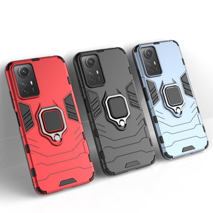 Magnetic ring phone case with rugged armor design, red color and dark accents.