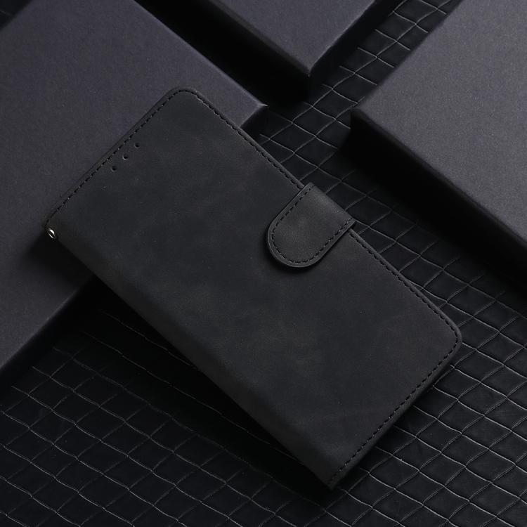 Black leather phone case with magnetic flap and visible stitching details.