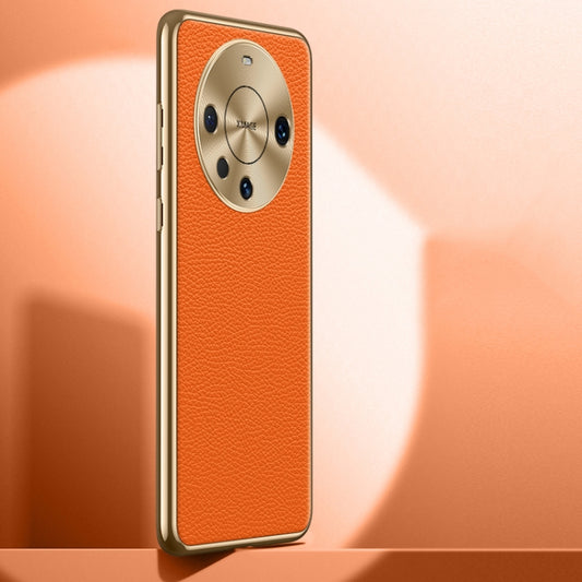 Orange litchi-textured genuine leather phone case with cutouts for camera and buttons