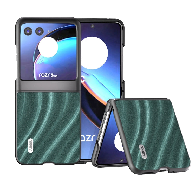 Protective phone case with dark green wavy stripe pattern and raised protective edges