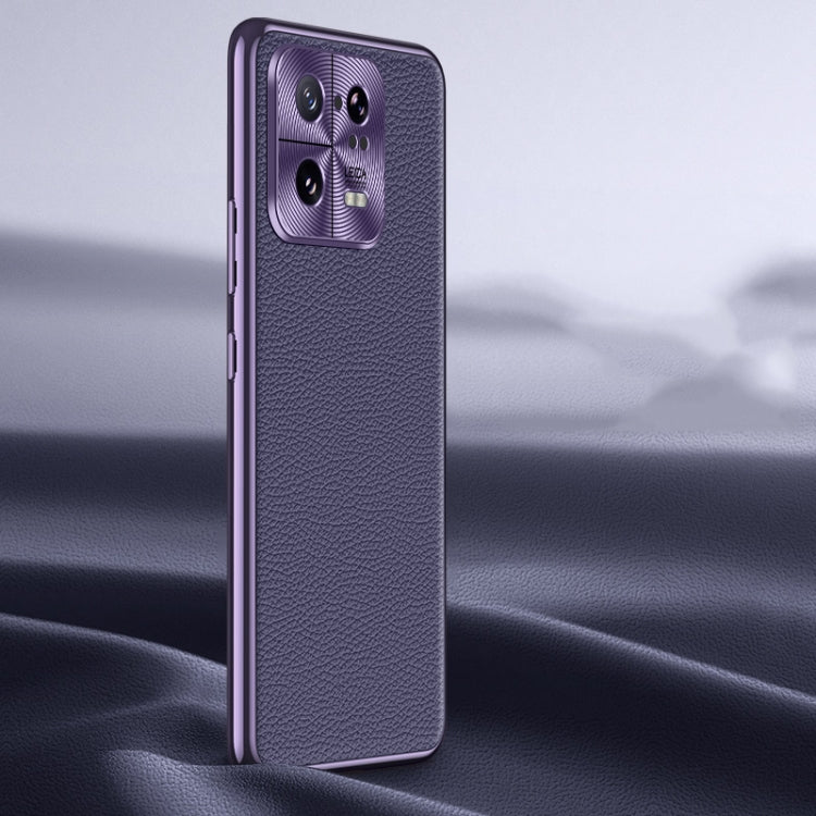 Purple litchi-texture genuine leather phone case with protective camera area