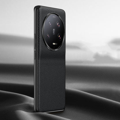 Black litchi-texture genuine leather phone case with camera cutout, back view.