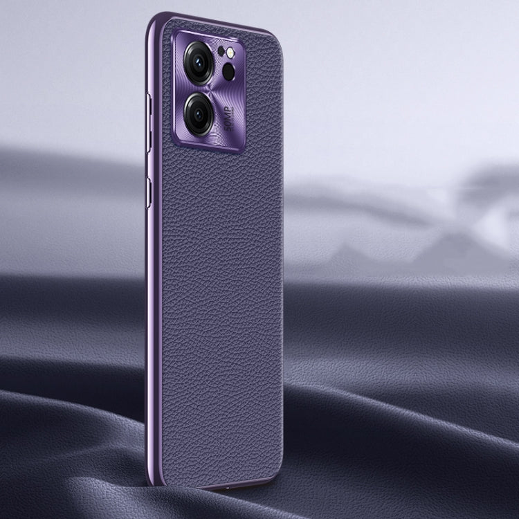 Purple litchi-texture genuine leather phone case, back view with camera lens cutout.
