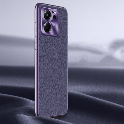 Purple litchi-texture genuine leather phone case, back view with camera lens cutout.