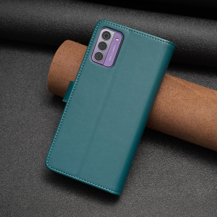 Teal leather flip phone wallet with camera cutout and stitched edges