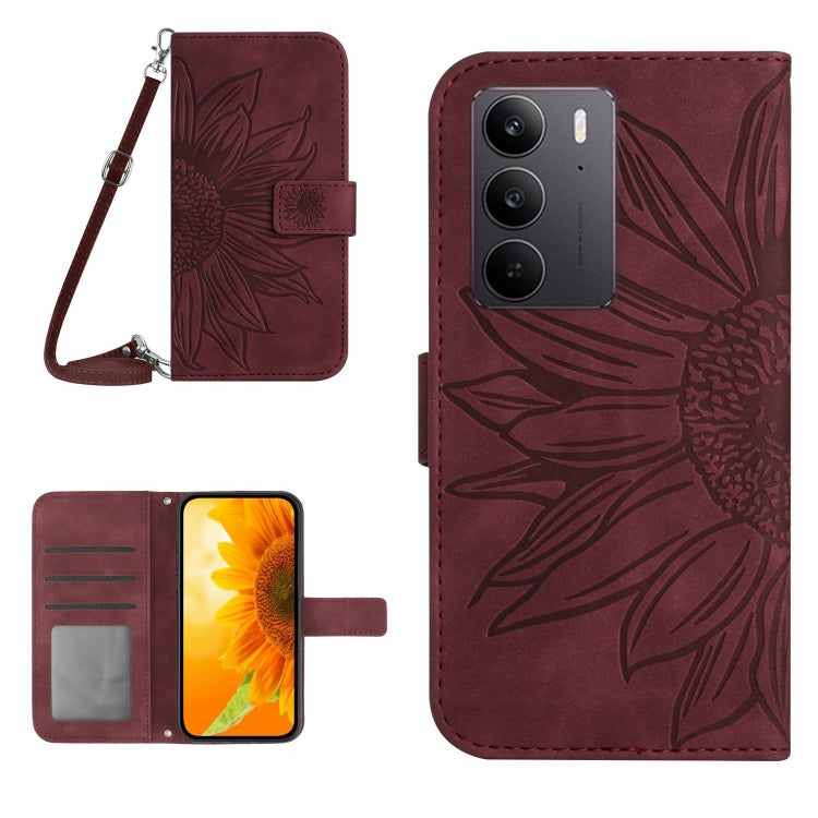 Wine red embossed sunflower flip phone case with strap, card holder and magnetic flap.