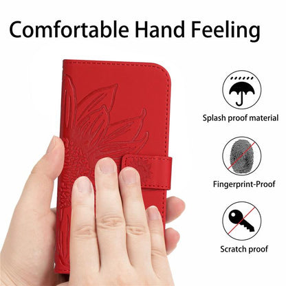 Red embossed flower flip phone wallet case held in hand, with magnetic front flap