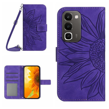 Purple embossed flower flip phone case with card slots and wrist lanyard strap.