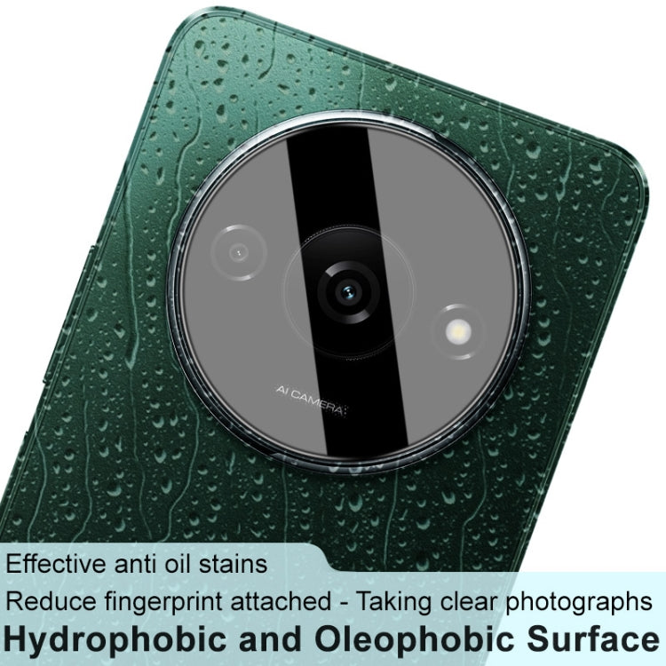 Black rear camera lens glass film with hydrophobic-style coverage on rear camera lens